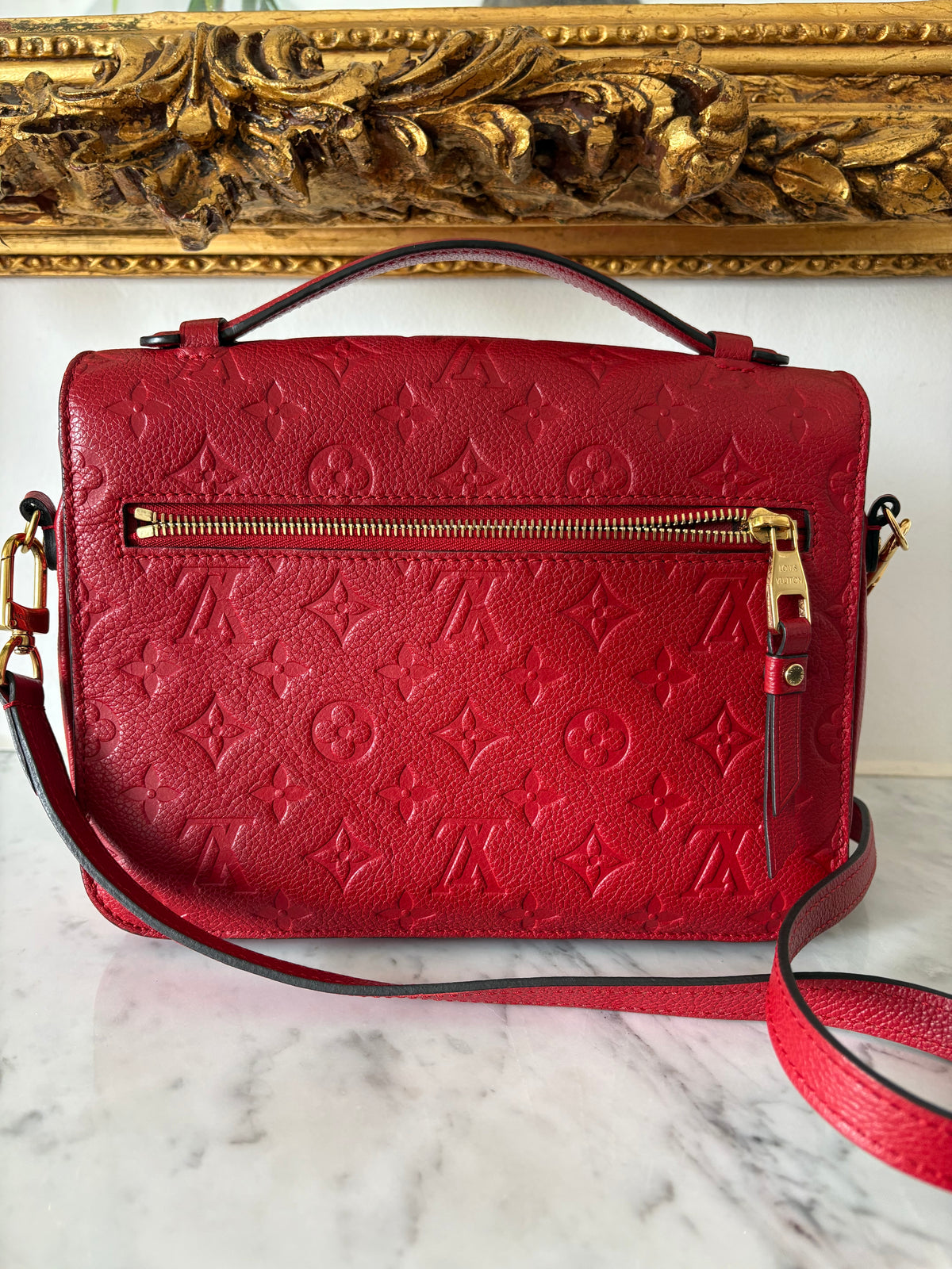 Louis Vuitton Métis Empreinte red
