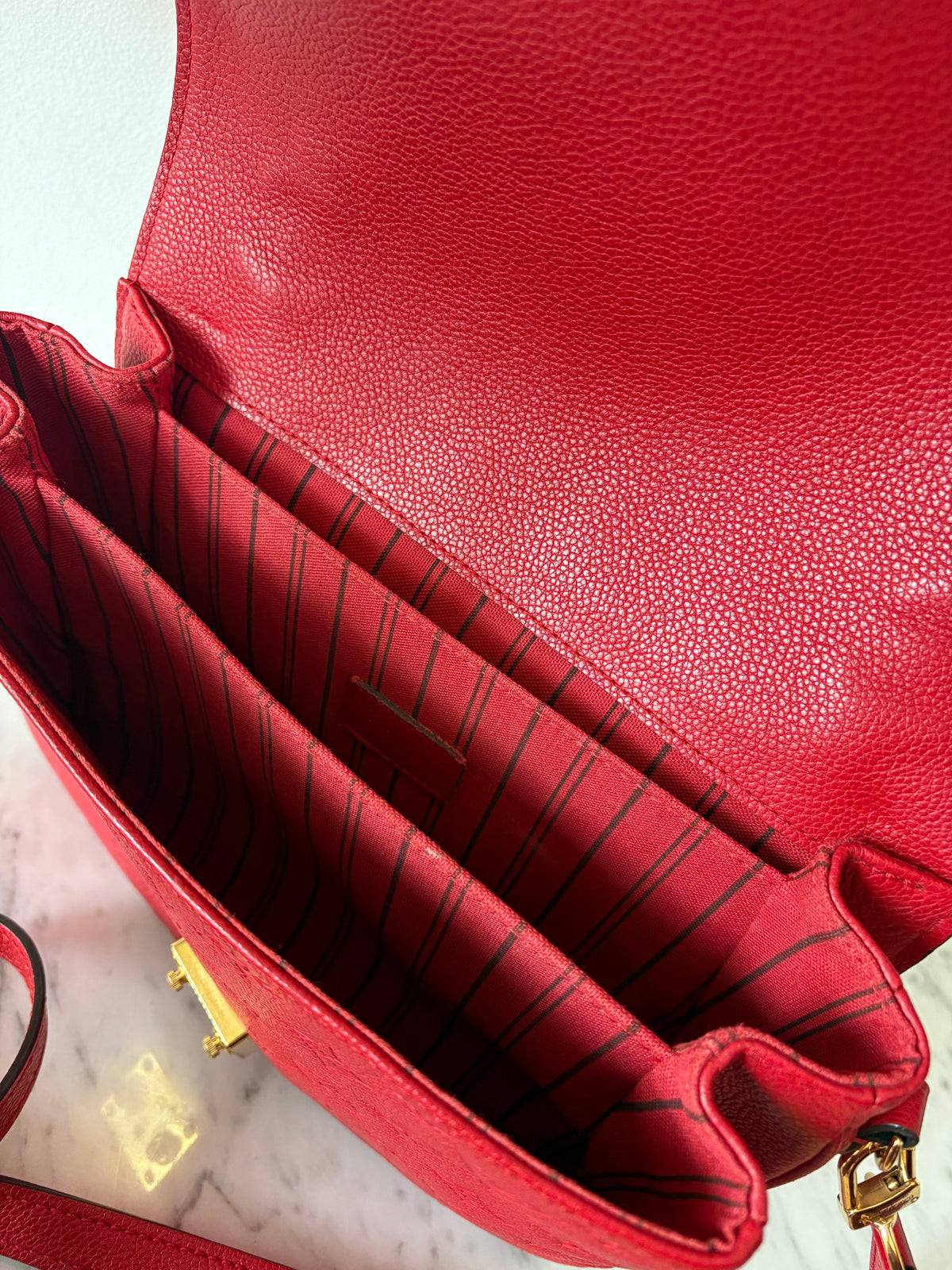 Louis Vuitton Métis Empreinte red