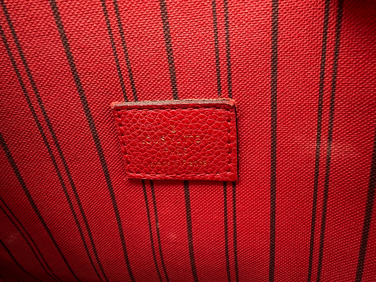 Louis Vuitton Métis Empreinte red