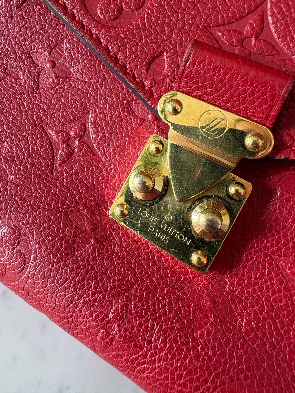 Louis Vuitton Métis Empreinte red