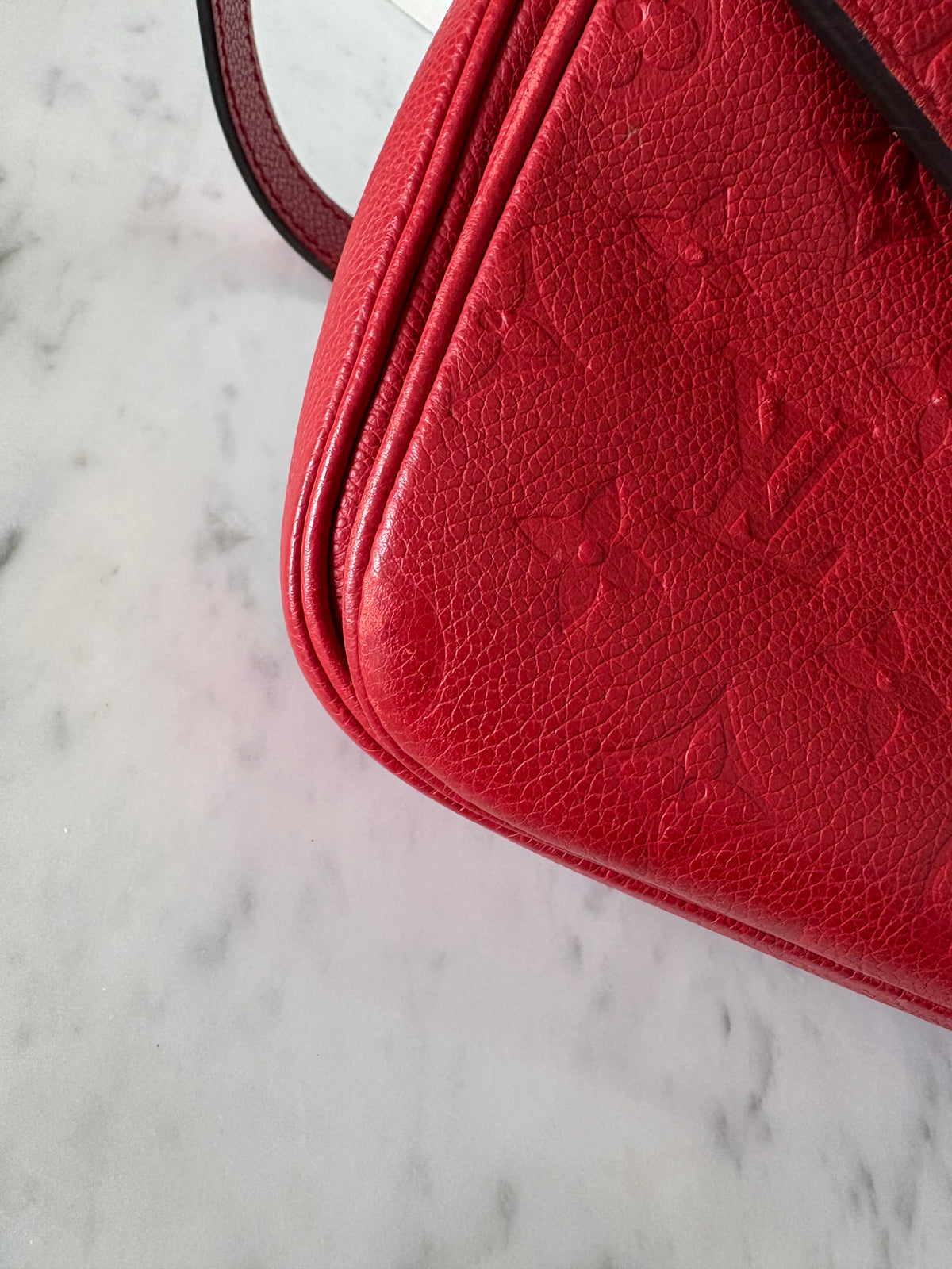 Louis Vuitton Métis Empreinte red
